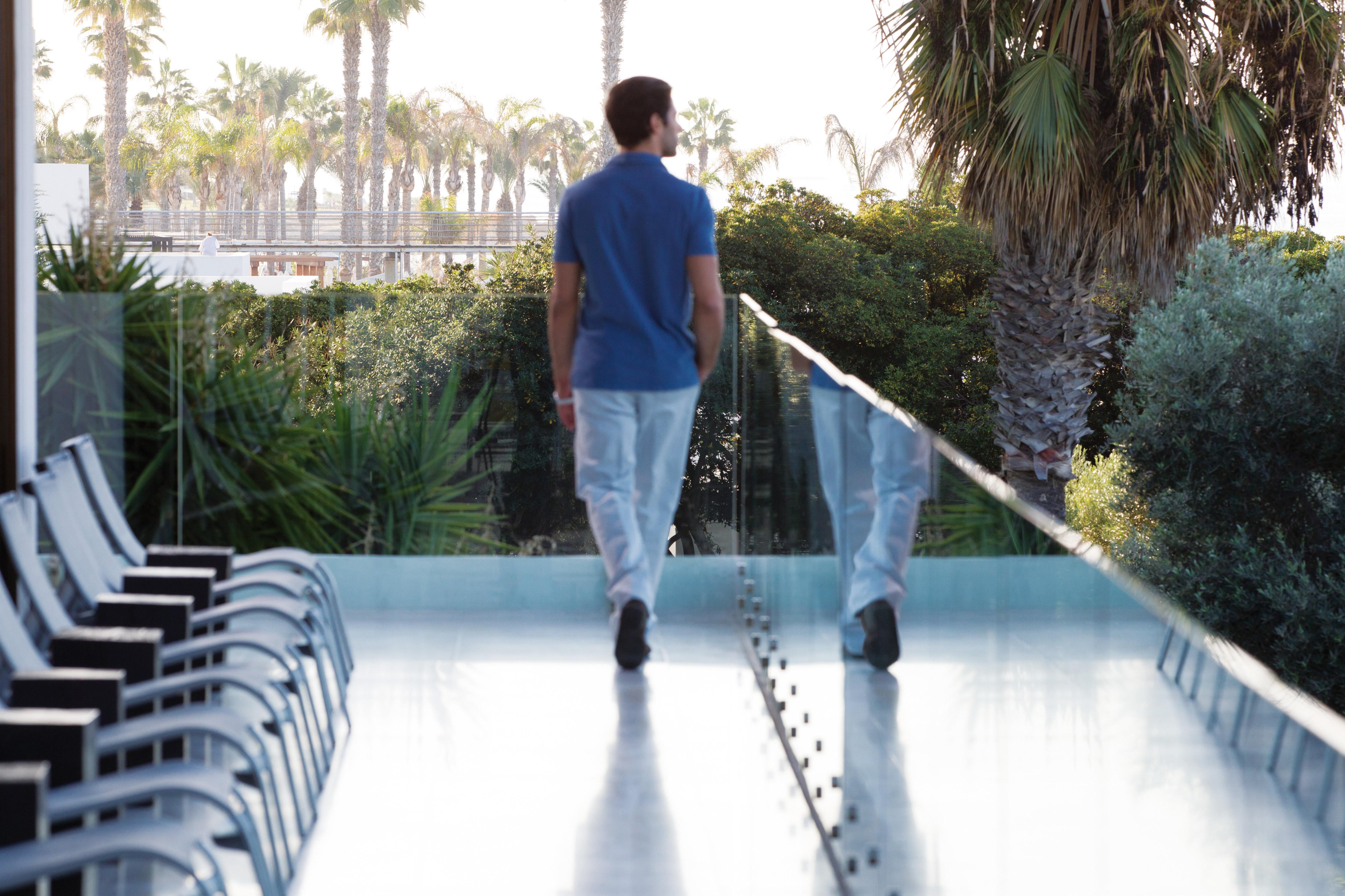 Almyra Paphos Exterior foto A man walking